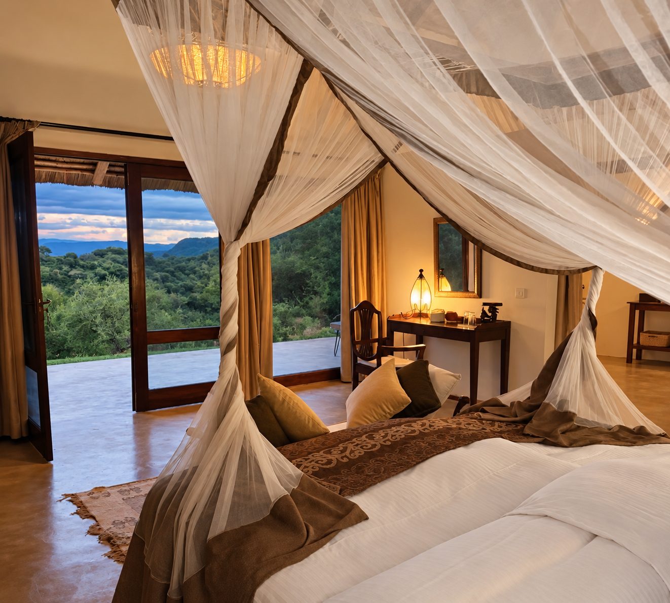 Bedroom with a canopy bed and glass doors opening to a view of the bush